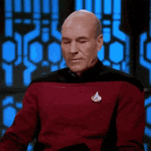 Captain Picard gives a facepalm reaction