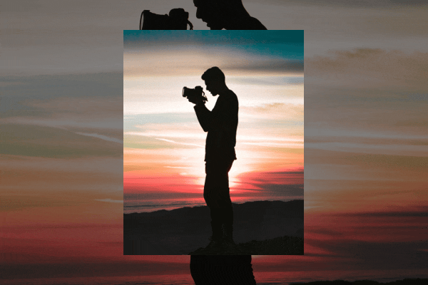 A monochrome photo of a person using a tripod appears in a vertical frame